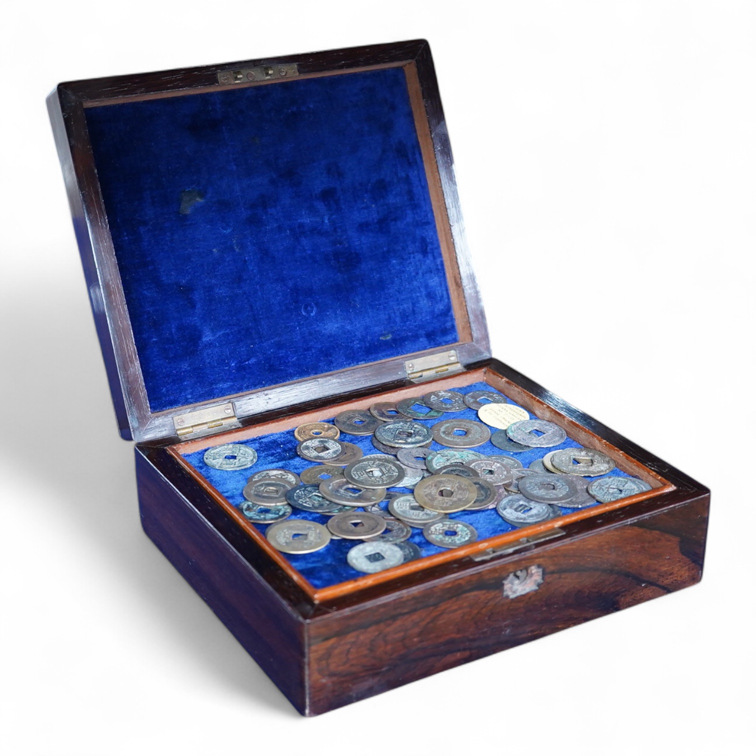 Chinese and Japanese coins, 16th to 20th century, including Chinese cast coins, Ming to Qing dynasty, Japanese Kan’ei Tsuho, in a rosewood box
